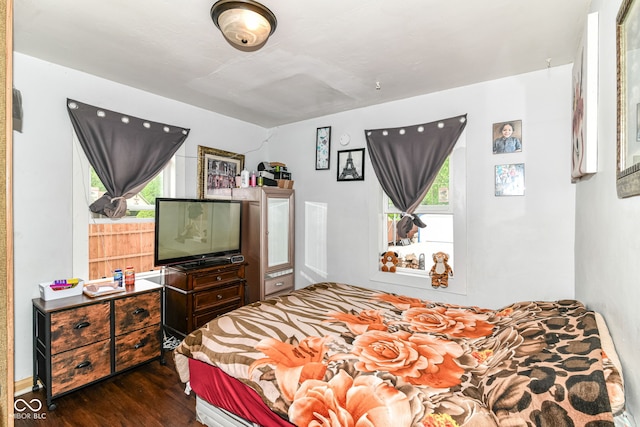 3302 N Gladstone Ave, Indianapolis, IN 46218 - bedroom featuring dark wood finished floors and lofted ceiling