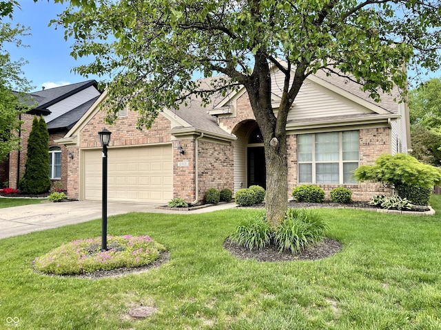 view of front facade featuring an attached garage, brick siding, driveway, and a front lawn