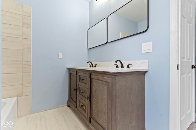 641 E 33rd St, Indianapolis, IN 46205 - bathroom with a tub to relax in and vanity