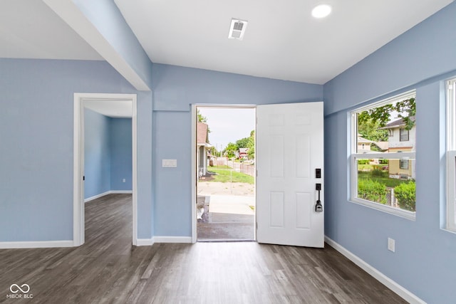 641 E 33rd St, Indianapolis, IN 46205 - foyer featuring wood finished floors, baseboards, and lofted ceiling