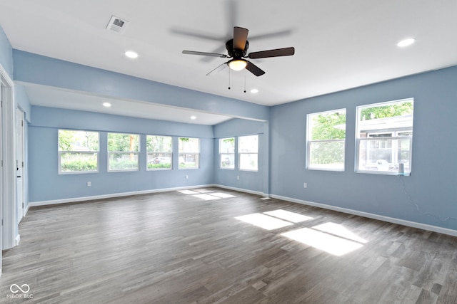 641 E 33rd St, Indianapolis, IN 46205 - unfurnished living room featuring baseboards, ceiling fan, wood finished floors, and recessed lighting