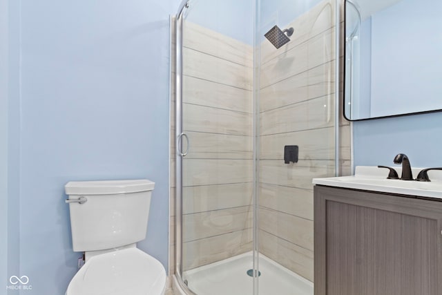641 E 33rd St, Indianapolis, IN 46205 - bathroom with a stall shower, toilet, and vanity