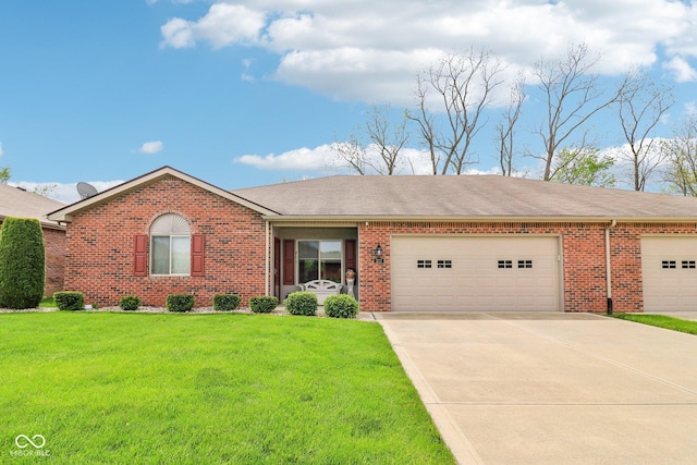 ranch-style house with brick siding, an attached garage, concrete driveway, and a front lawn