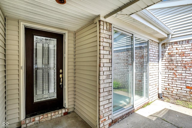 7642 Lancer Ln, Lawrence, IN 46226 - property entrance with brick siding
