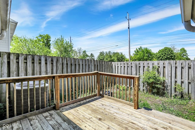 7642 Lancer Ln, Lawrence, IN 46226 - wooden deck with a fenced backyard and cooling unit