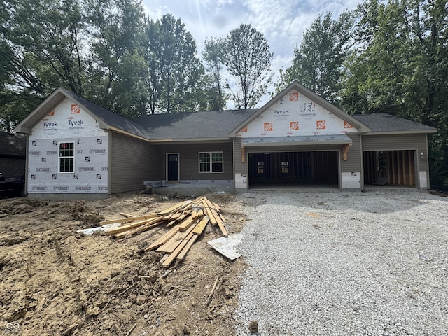 497 Mill Spgs, Coatesville, IN 46121 - property under construction featuring a garage and driveway