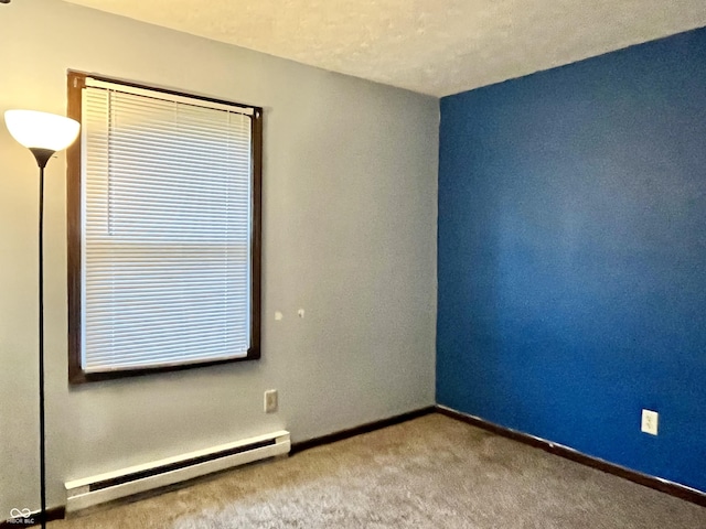 124 Brookside Dr, Hope, IN 47246 - carpeted empty room featuring baseboard heating and baseboards