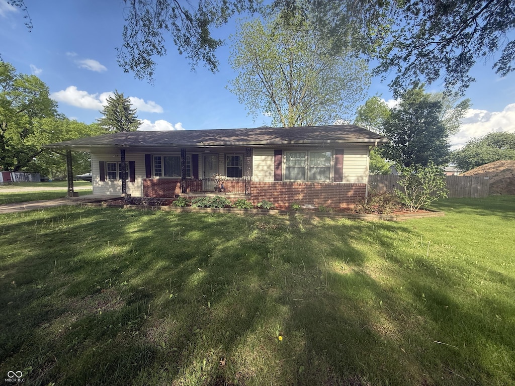 404 S 5th St, Cayuga, IN 47928 - ranch-style house featuring brick siding and covered porch