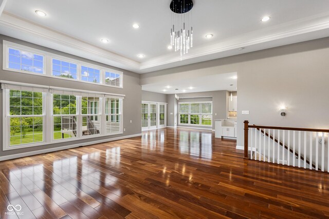 888 Westcreek Dr, Columbus, IN 47201 - unfurnished living room featuring hardwood / wood-style flooring, crown molding, and recessed lighting