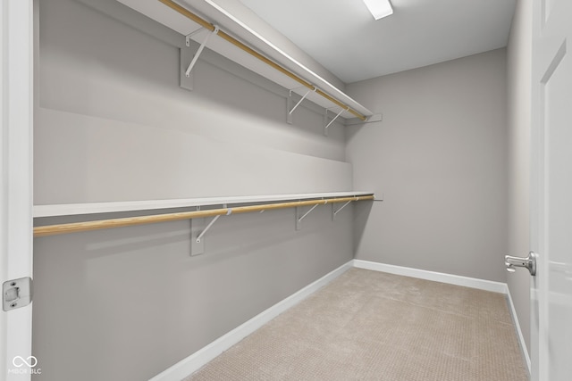 888 Westcreek Dr, Columbus, IN 47201 - walk in closet featuring carpet
