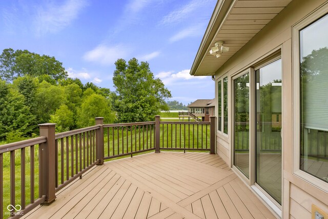 888 Westcreek Dr, Columbus, IN 47201 - wooden deck featuring a lawn
