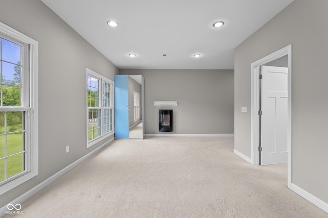 888 Westcreek Dr, Columbus, IN 47201 - unfurnished living room with carpet flooring and recessed lighting
