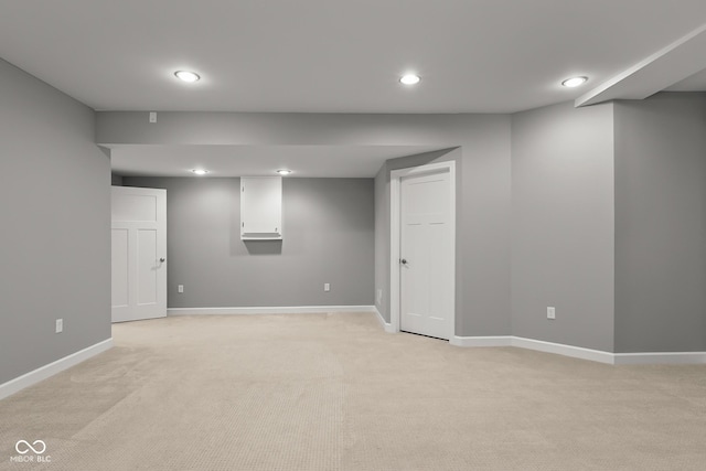 888 Westcreek Dr, Columbus, IN 47201 - finished basement featuring light colored carpet and recessed lighting