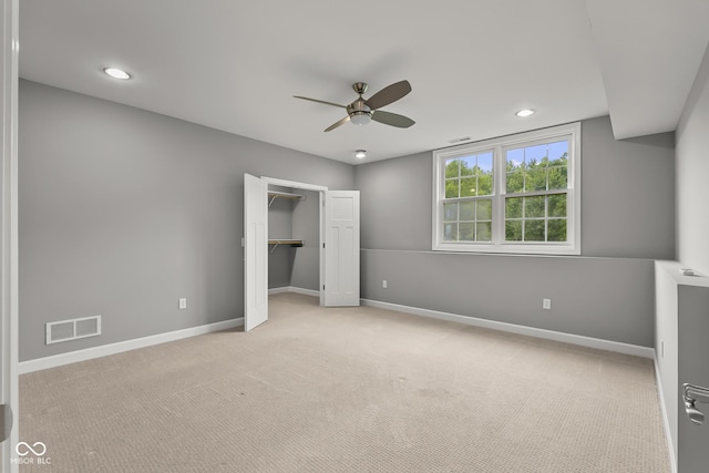 888 Westcreek Dr, Columbus, IN 47201 - unfurnished bedroom featuring light colored carpet, recessed lighting, a spacious closet, and ceiling fan
