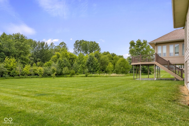 888 Westcreek Dr, Columbus, IN 47201 - view of green lawn featuring a wooden deck and stairway