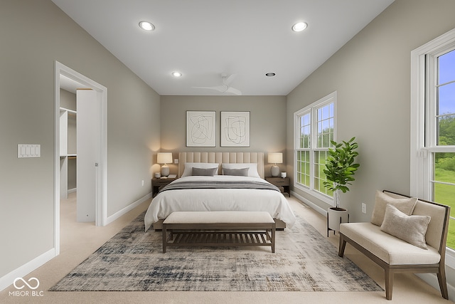 888 Westcreek Dr, Columbus, IN 47201 - bedroom with recessed lighting, light colored carpet, and a walk in closet