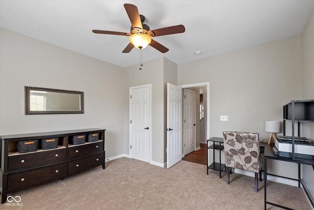 695 Bobtail Dr, Greenfield, IN 46140 - office area with light colored carpet, ceiling fan, and baseboards