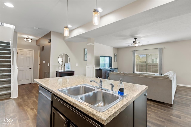 695 Bobtail Dr, Greenfield, IN 46140 - kitchen featuring a sink, dishwasher, light countertops, dark wood-style flooring, and recessed lighting