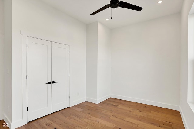unfurnished bedroom featuring recessed lighting, light wood-style flooring, baseboards, and ceiling fan