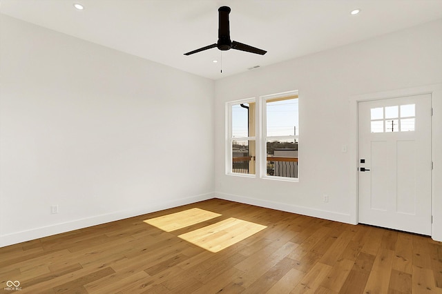 entryway featuring light wood-type flooring, baseboards, a ceiling fan, and recessed lighting