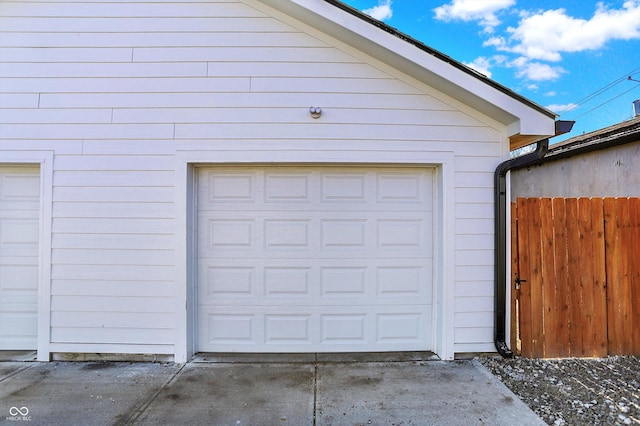 garage featuring fence