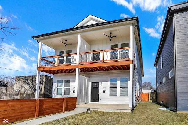 view of front of property with a ceiling fan, a balcony, and board and batten siding