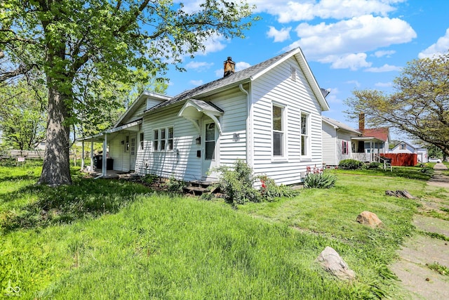 view of property exterior with a chimney