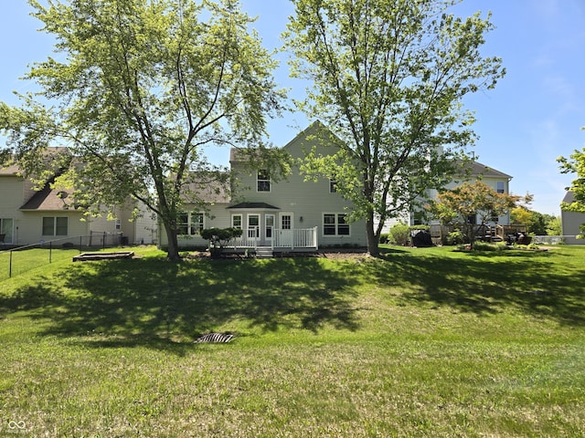 6369 Kelsey Dr, Indianapolis, IN 46268 - back of house featuring a wooden deck