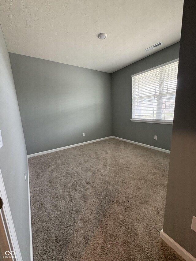 1380 Fairmount Dr, Greenfield, IN 46140 - unfurnished room featuring carpet floors and baseboards