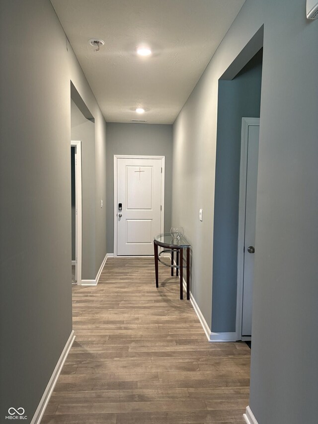 1380 Fairmount Dr, Greenfield, IN 46140 - hall featuring wood finished floors and baseboards