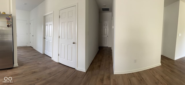 142 Winding Brook Way, Pendleton, IN 46064 - hall with dark wood-style floors and baseboards