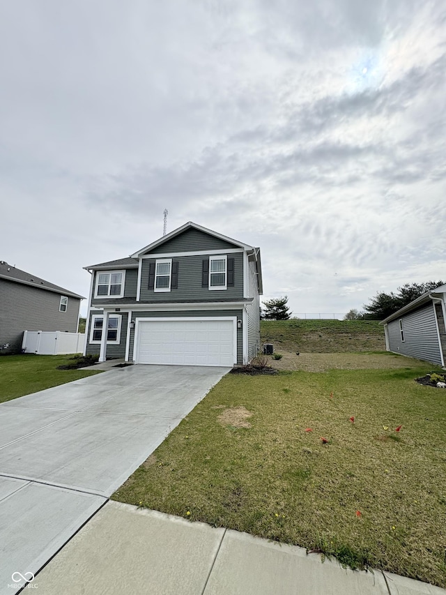 10931 N Longbranch St, Monrovia, IN 46157 - view of front of property featuring a garage, concrete driveway, and a front yard