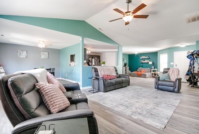 6190 E Ayrshire Cir, Camby, IN 46113 - living room with a ceiling fan, lofted ceiling, wood finished floors, and baseboards