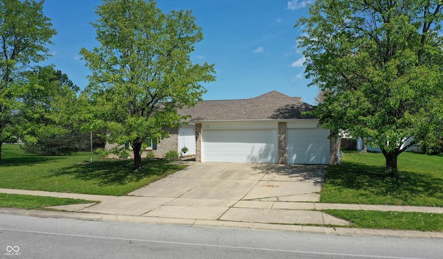6190 E Ayrshire Cir, Camby, IN 46113 - view of property hidden behind natural elements featuring driveway, a garage, a front lawn, and brick siding