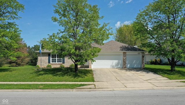 6190 E Ayrshire Cir, Camby, IN 46113 - obstructed view of property featuring a garage, driveway, a front yard, and brick siding