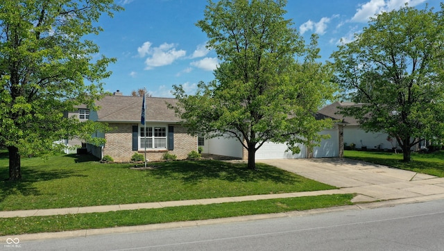 6190 E Ayrshire Cir, Camby, IN 46113 - view of front of home featuring concrete driveway, a front yard, an attached garage, and brick siding