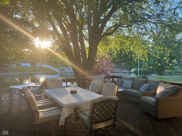 795 SE Santee Dr, Greensburg, IN 47240 - wooden terrace featuring a water view, outdoor dining space, and an outdoor hangout area
