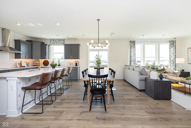 175 Rock Island Rd, Westfield, IN 46074 - dining area with a chandelier, light wood-style flooring, and recessed lighting
