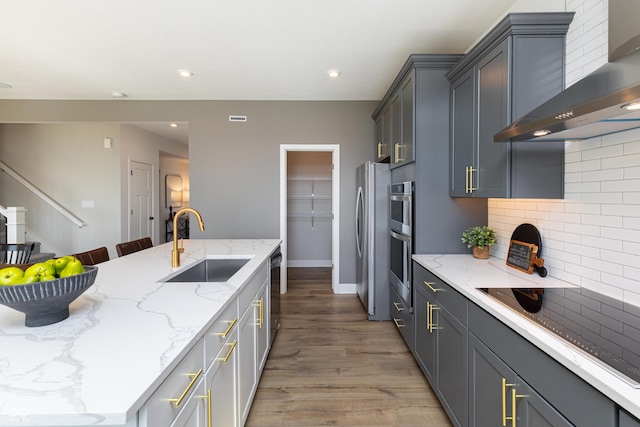 175 Rock Island Rd, Westfield, IN 46074 - kitchen with wall chimney range hood, a sink, black electric stovetop, dishwashing machine, and freestanding refrigerator