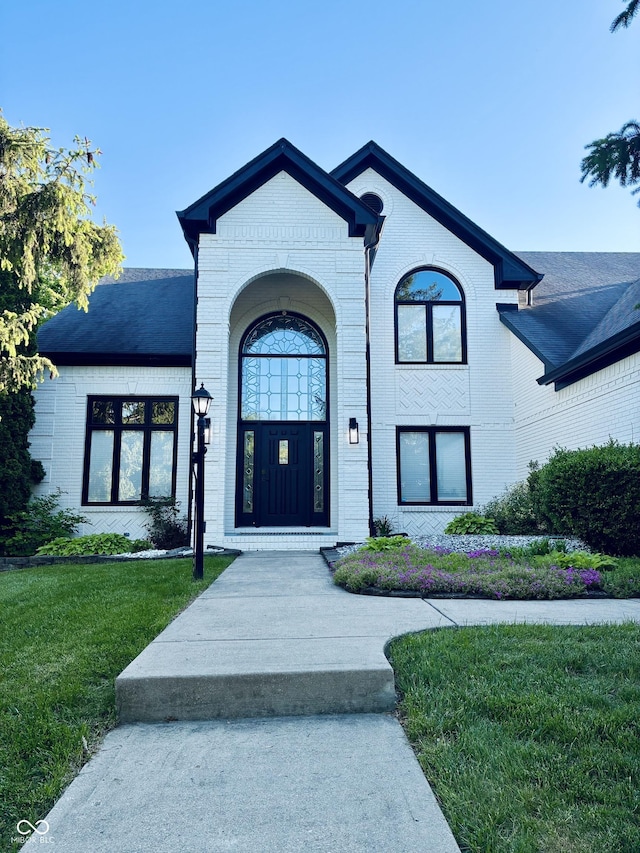 4601 Fairhope Dr, Indianapolis, IN 46237 - french country home featuring brick siding and a front yard