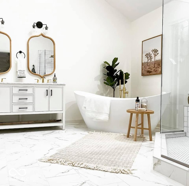4601 Fairhope Dr, Indianapolis, IN 46237 - full bath with marble look tile flooring, a freestanding bath, and vanity