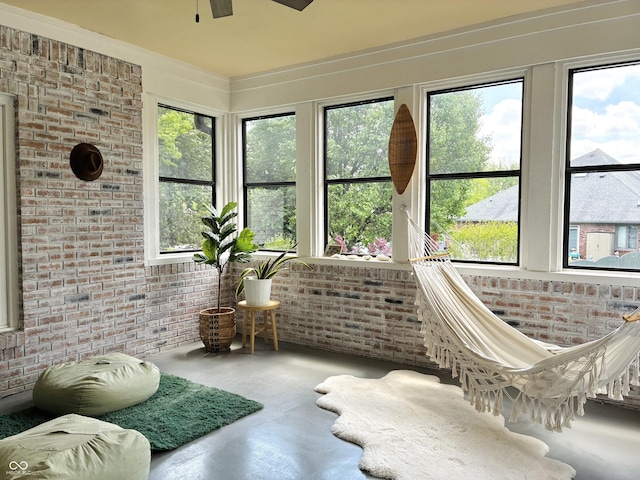 4601 Fairhope Dr, Indianapolis, IN 46237 - sunroom / solarium featuring brick wall and finished concrete flooring
