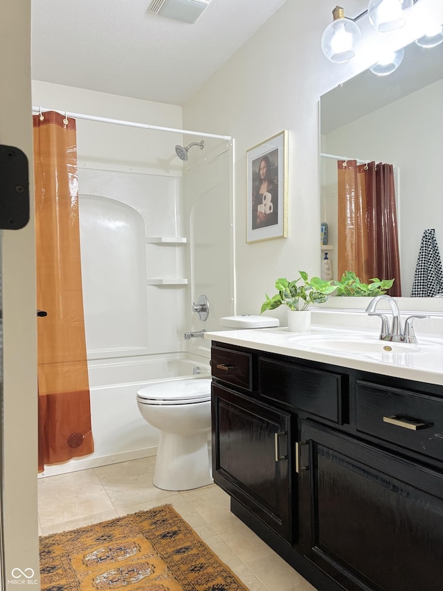 4601 Fairhope Dr, Indianapolis, IN 46237 - full bathroom with tile patterned floors, vanity, shower / tub combo, and toilet