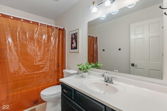 4601 Fairhope Dr, Indianapolis, IN 46237 - full bath with vanity, toilet, tile patterned floors, and a shower with curtain