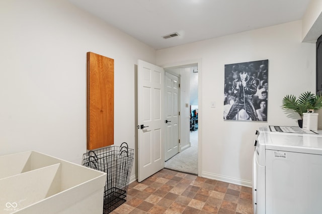 4601 Fairhope Dr, Indianapolis, IN 46237 - washroom with stone finish flooring, baseboards, and washer and dryer