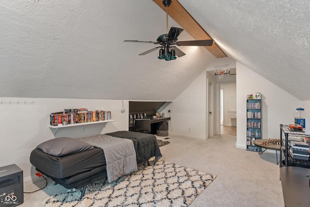 4601 Fairhope Dr, Indianapolis, IN 46237 - bedroom featuring a textured ceiling, lofted ceiling, carpet flooring, baseboards, and a ceiling fan