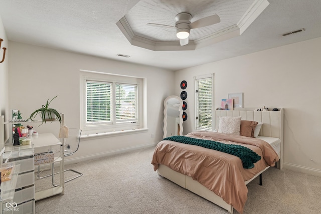 4601 Fairhope Dr, Indianapolis, IN 46237 - carpeted bedroom with baseboards, multiple windows, a raised ceiling, a ceiling fan, and crown molding