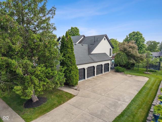 4601 Fairhope Dr, Indianapolis, IN 46237 - view of home's exterior with concrete driveway and roof with shingles