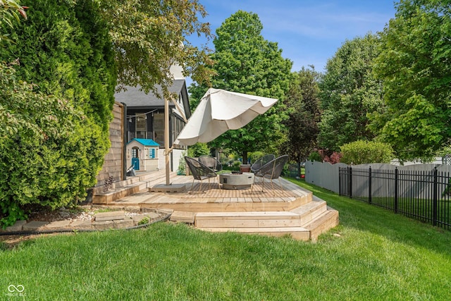 4601 Fairhope Dr, Indianapolis, IN 46237 - view of yard featuring a deck and a fire pit