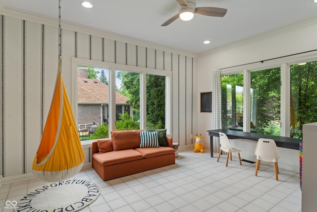 4601 Fairhope Dr, Indianapolis, IN 46237 - living room with crown molding, plenty of natural light, baseboards, ceiling fan, and light tile patterned flooring